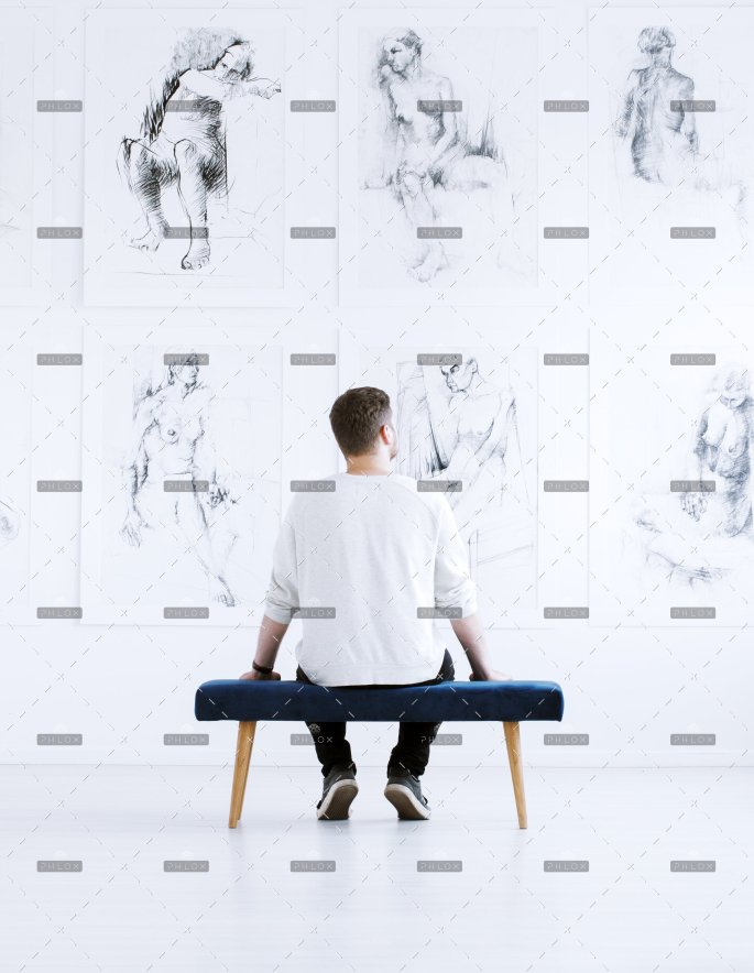 demo-attachment-218-man-relaxing-in-art-gallery-P9C4CGY-1